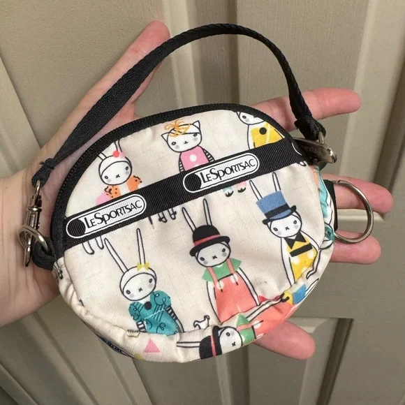 LeSportsac Round Wristlet Pouch in Cream with Multicolor Bunny Picnic Print - Picture 1 of 10
